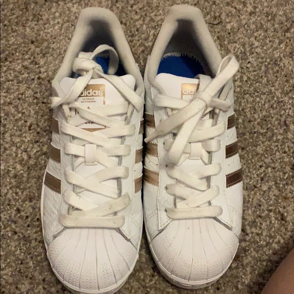 Rose gold and white adidas